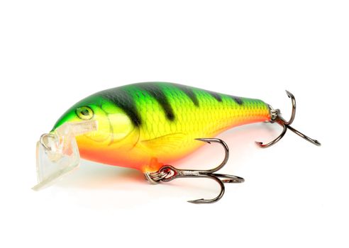 green artificial fish hooks for fishing on the surface of predators
