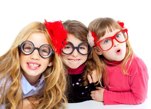 nerd children girl group with glasses and funny expression