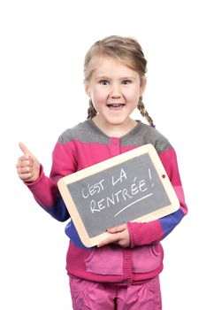 girl holding slate on white background