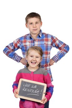 Happy children holding slate