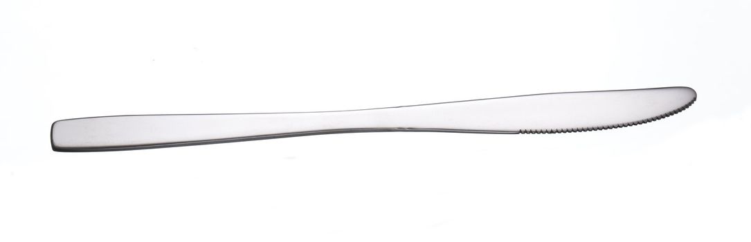kithcen table silver shiny knife over white