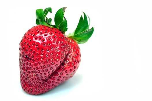 Photo of a beautiful strawberry isolated on white background