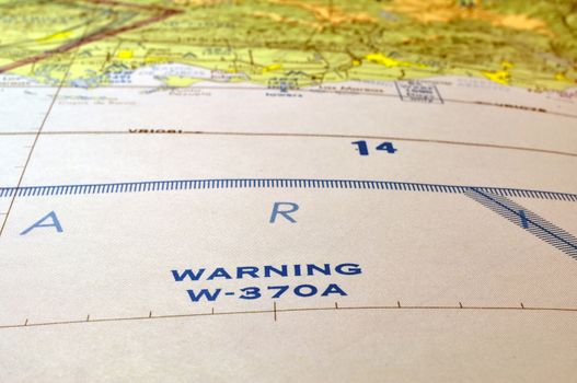 Warning legend on map of a Caribbean island.