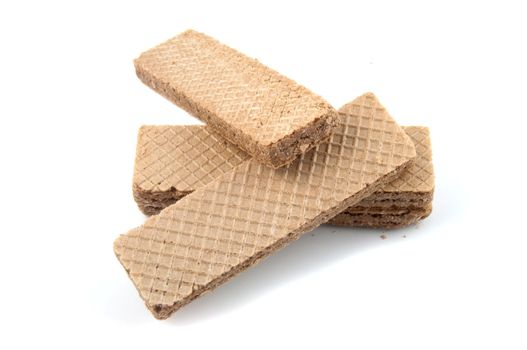 A stack of Chocolate wafer cookies isolated on white.