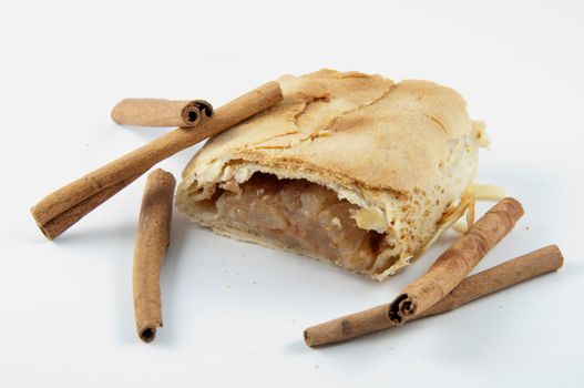 A slice of apple strudel isolated on white