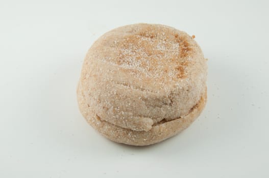 An english muffin cut in half (isolated)