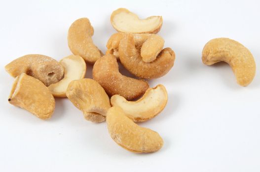 A pile of cashews isolated on white.