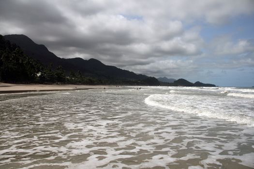 tourists walking on the beach on white sand beach koh chang island thailand