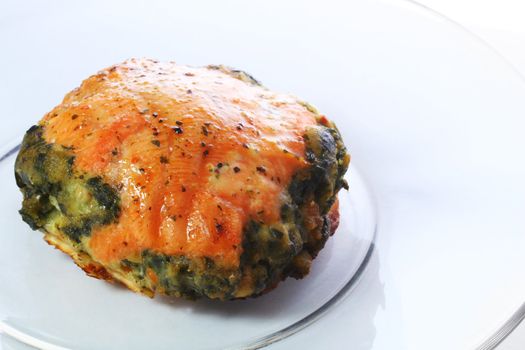 Baked salmon stuffed with spinach.