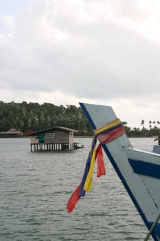 floating house and a boat detail