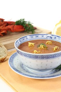 fresh Asian lobster soup with lemon, dill and bread