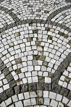 Ancient ceramic tiled decorative stone walkway.