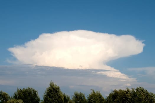 A white cloud on a blue sky