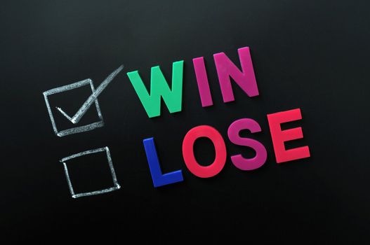 Win and lose check boxes with win checked on a blackboard