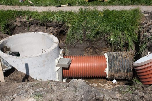  installing sewerage system for a new street building