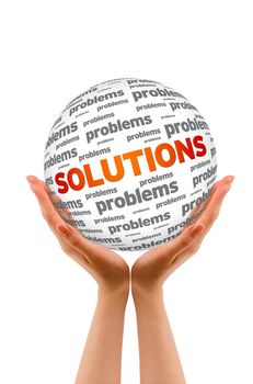Hands holding a Solutions Sphere sign on white background.