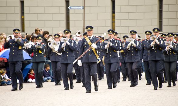 Relieved guard after the changing of the guards ceremony at the Royal Palace. The clear blue uniform is used solely by the soldiers of the Cavalry Battalion.