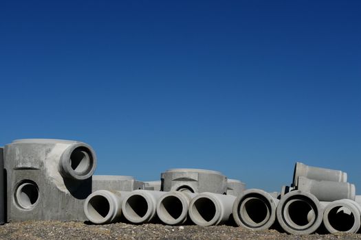 concrete pipes on a building site on a sunny day