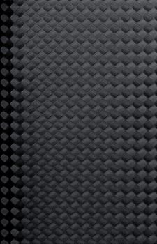 Black rubber texture closeup background.
