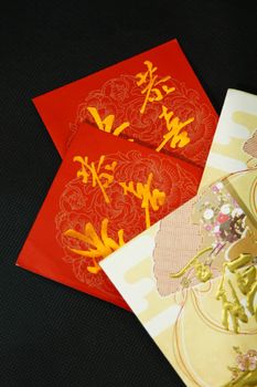 Red packets on black background