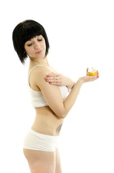 Woman with body cream. Isolated on white background