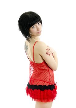 Brunette posing in red lingerie. isolated on white background.
