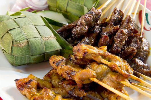 Chicken and Lamb Satay Skewers with Ketupat Rice Wrapped in Coconut Leaf