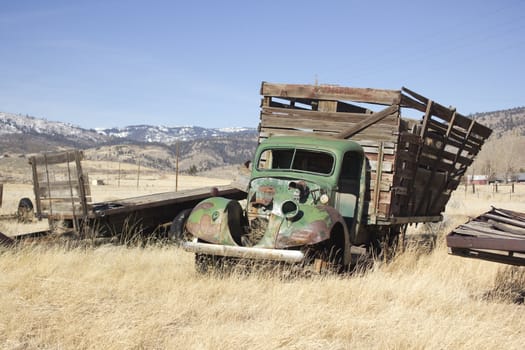 and old farm truck thats falling apart.