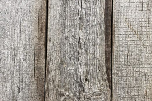 Three old wooden boards with erosion surface