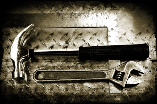  Work tools on a grunge metal background