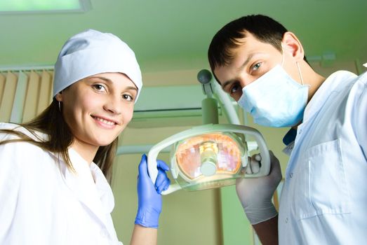 dentist and assistant, medical treatment at the dentist office
