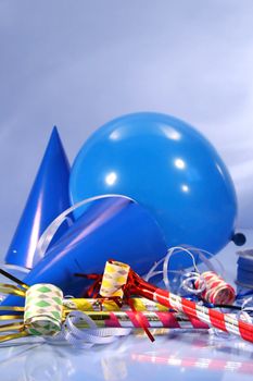 Party decorations with hats, ribbons and balloons