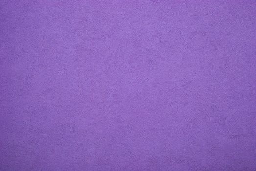 House wall covered with violet plaster as background