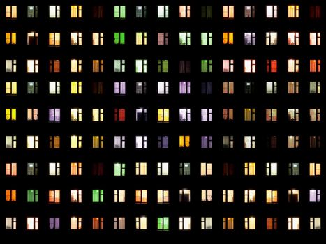 Seamless texture from set of windows on a black background - night