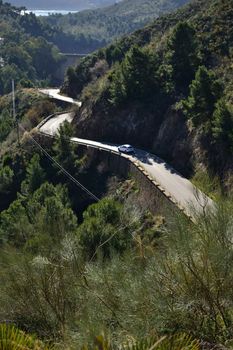 view from the mountain road leading over the city malaga