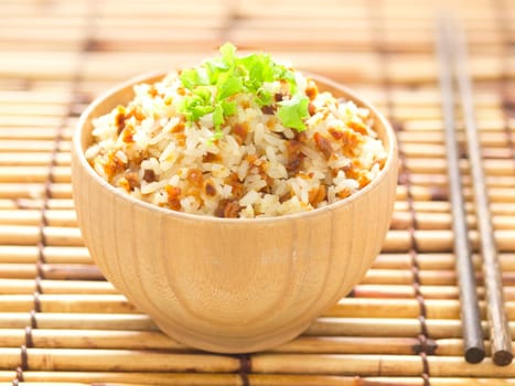 close up of a bowl of garlic fried rice