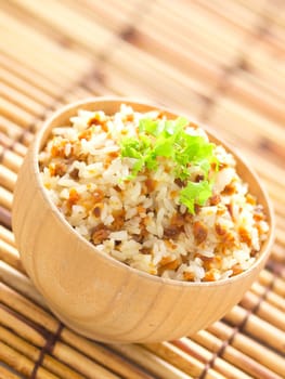 close up of a bowl of garlic fried rice