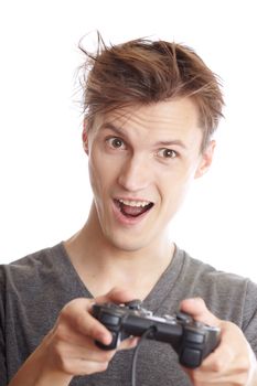 Laughing man plays computer game using joystick