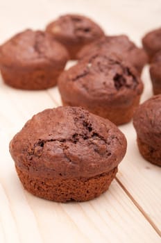 Close Up of Chocolate Muffins on Wooden Table