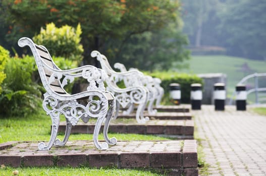 bench in the park, relaxed and tranquil atmosphere.
