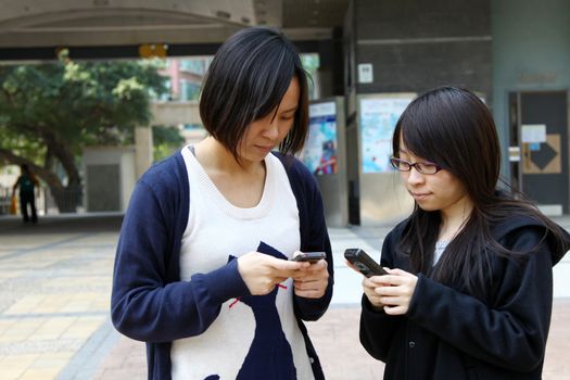 Asian woman using mobile phone 