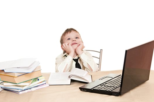 boy pupil thinks for in time  homework isolated on white background