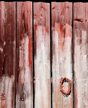 Old wooden rural house wall made of plank board backdrop background.