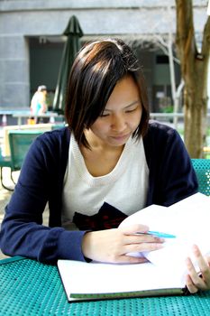 Asian girl studying in university