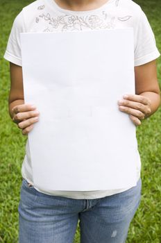 woman holding a blank board