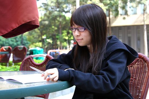 Asian girl studying in university