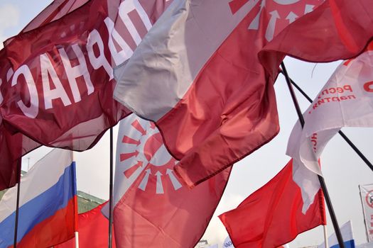 Waving flags including flag of the Russian People’s Freedom party                                                                             “PARNAS”