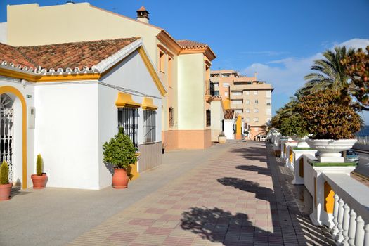 Estepona street along the beach, a tourist town abandoned after the season