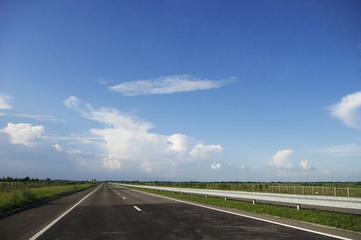 a view of highway, with no cars.
