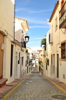 The narrow streets of old town in Andalucia is situated between Pomerania and the mountains